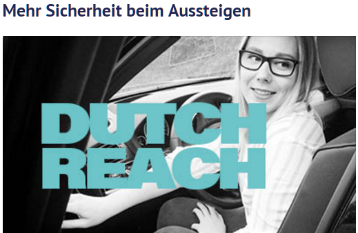 Photo of woman driver exiting from driver's seat with far (right) hand on door handle smailling, blonde, doing Dutch Reach. From Die Autohause Kenner - The Car Dealer Connoisseurs' blog post on the Dutch Reach.