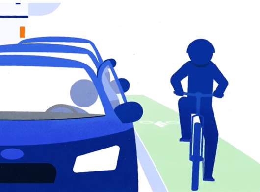 Image of a cyclist riding in bike lane approaches a parked driver about to exit.